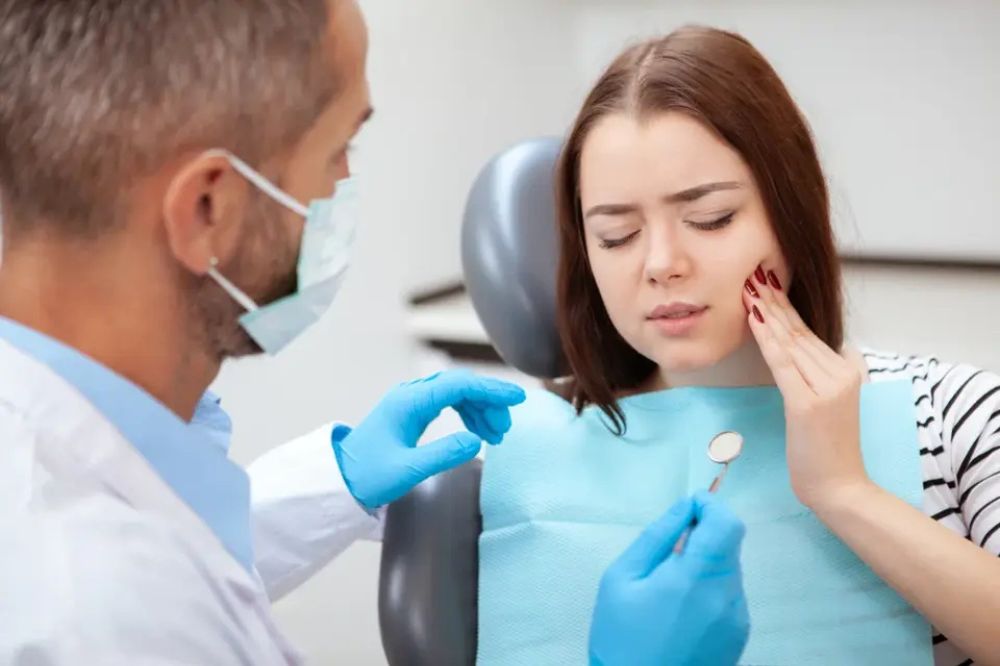 a women is getting dental treatment